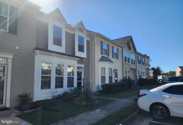 a view of a car park in front of a building