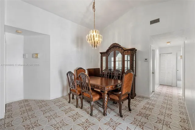 a view of a dining room with furniture