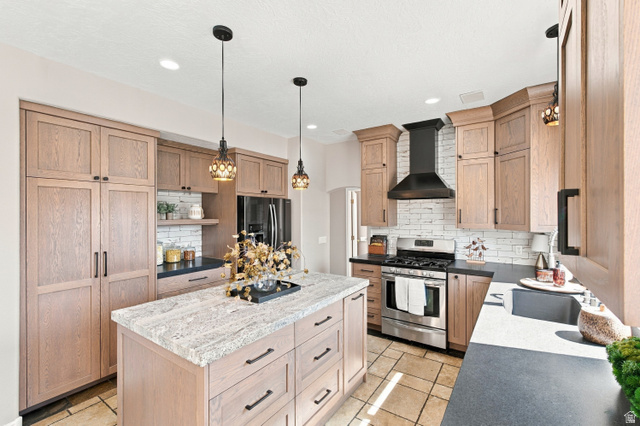 926 Ibis Way Draper, UT 84020 - Photo 7 of 41 Chef's dream custom kitchen. When we say custom, we mean every inch is well thought out and built to perfection.