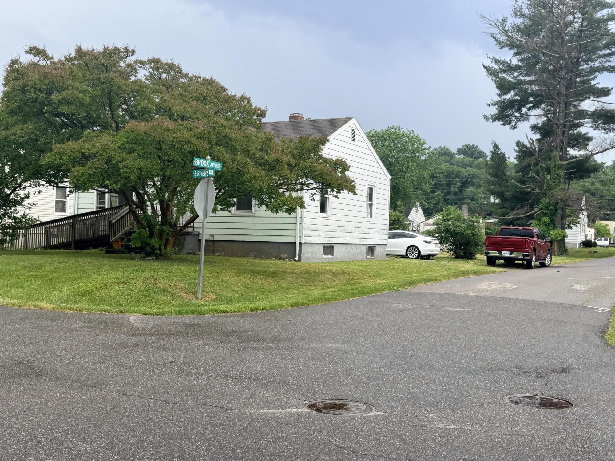300 East Riverside Drive Salem, VA 24153 - Photo 1 of 11 a view of road and car parked in back