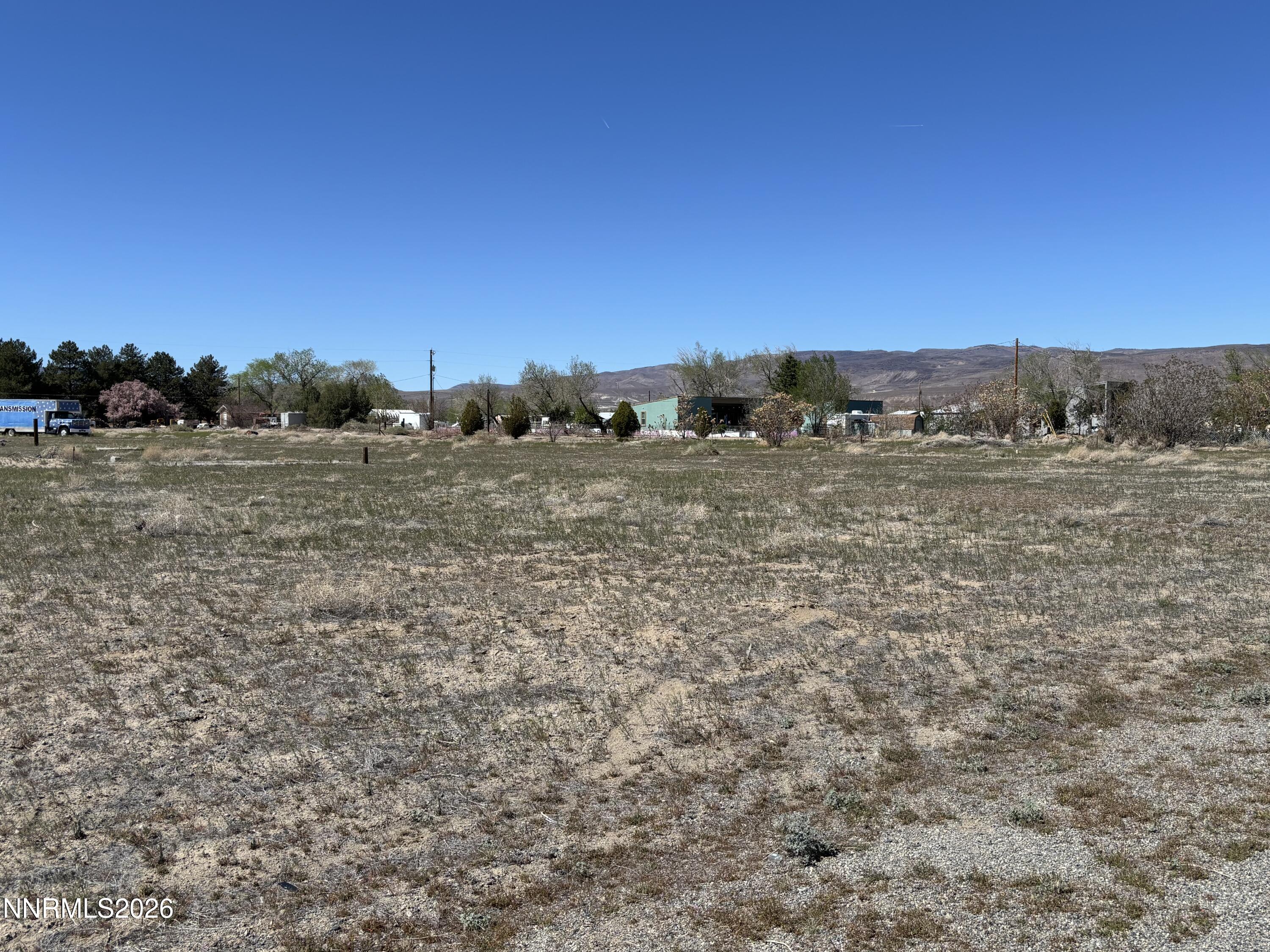 3913 Elm Street Silver Springs, NV 89429 - Photo 3 of 6 a view of beach and outdoor space