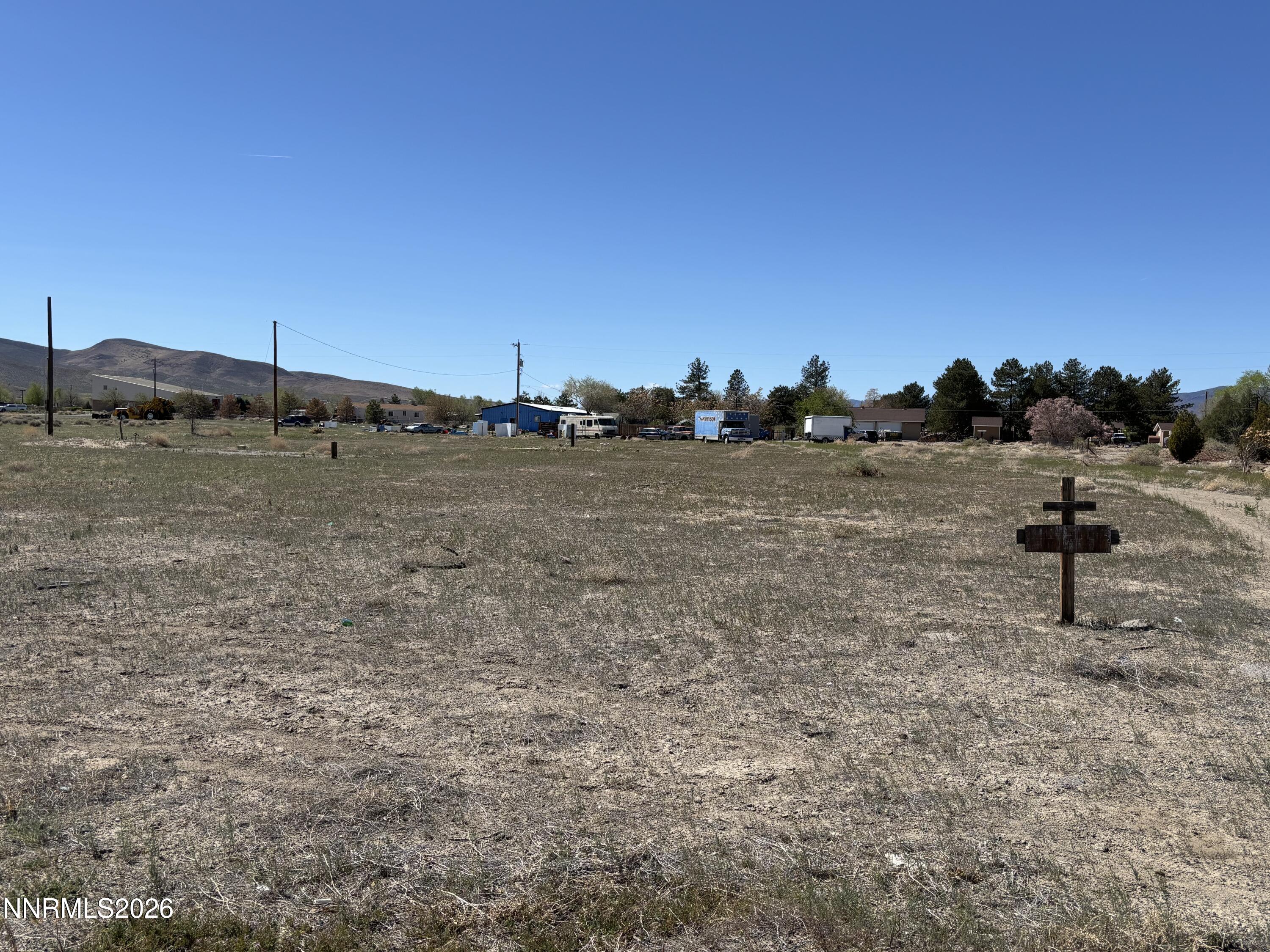 3913 Elm Street Silver Springs, NV 89429 - Photo 4 of 6 a view of a field with an ocean