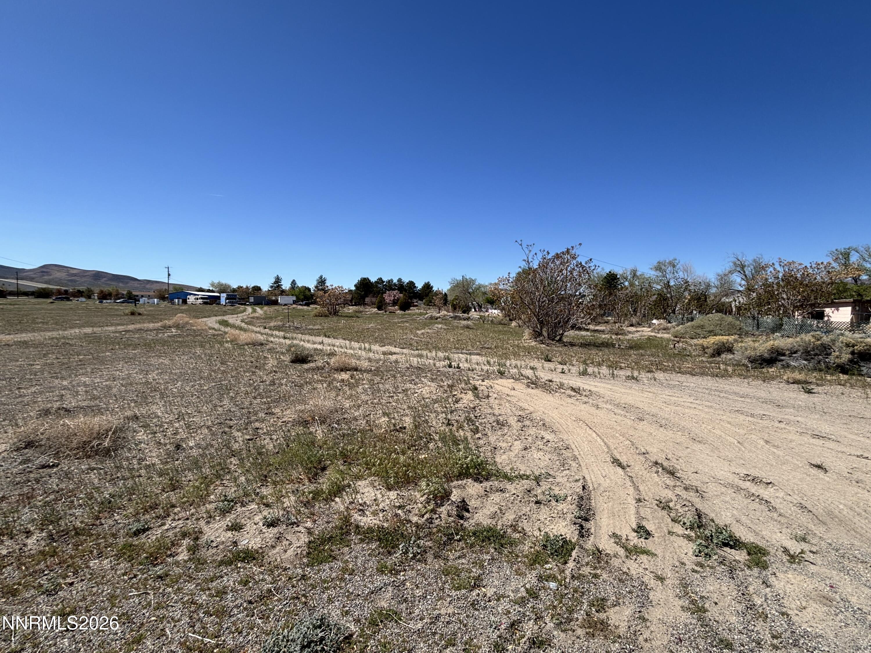3913 Elm Street Silver Springs, NV 89429 - Photo 5 of 6 a view of ocean view with beach and mountain view