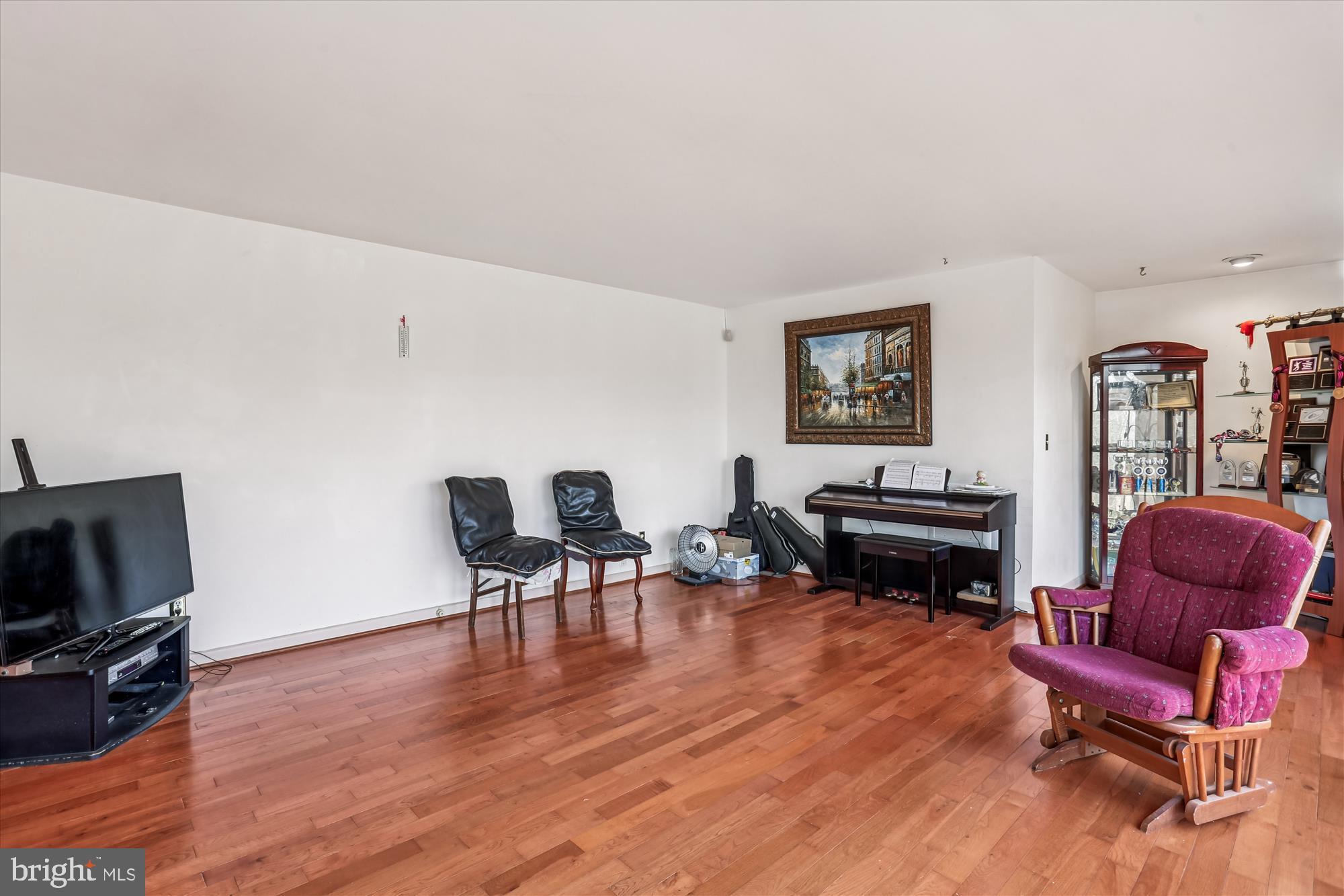 22820 Shiloh Church Road Boyds, MD 20841 - Photo 22 of 42 Spacious living area with warm wooden floors.