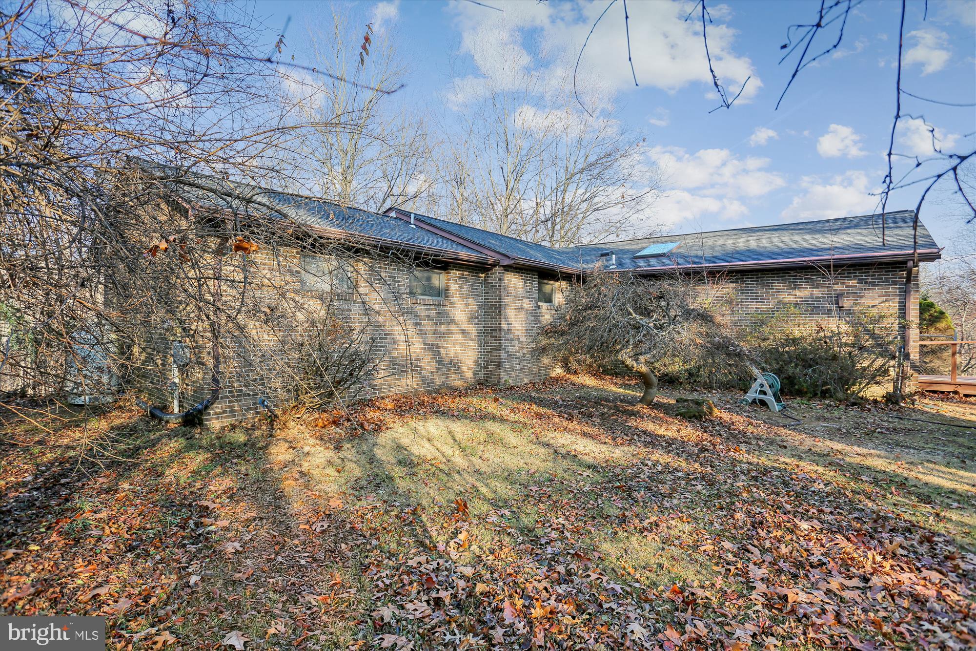22820 Shiloh Church Road Boyds, MD 20841 - Photo 7 of 42 Charming brick home nestled in nature's embrace.
