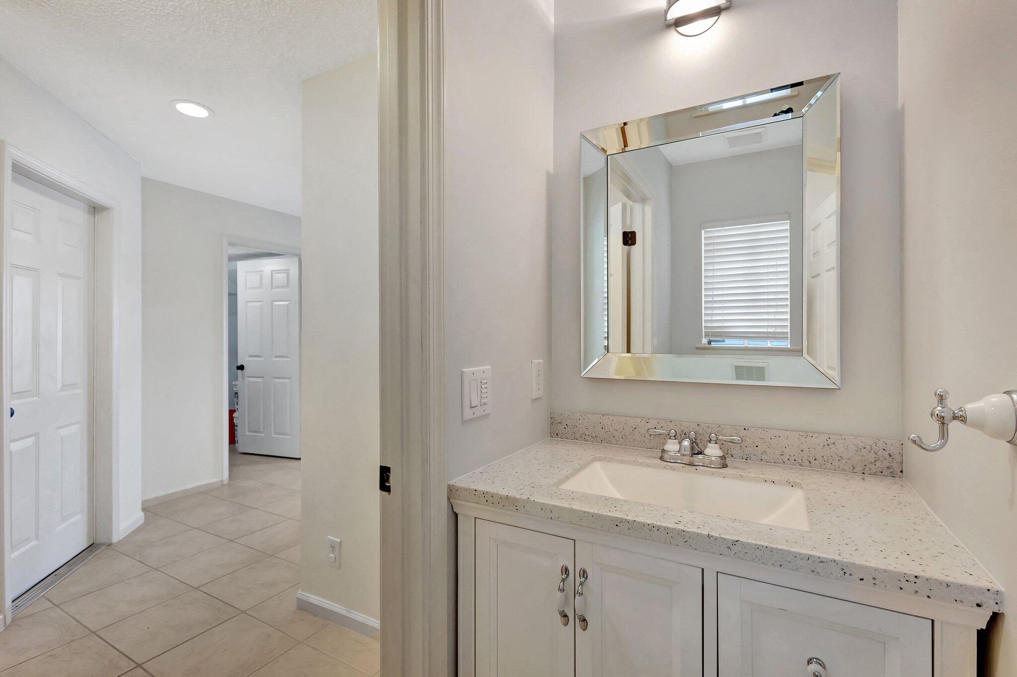 756 Imperial Lake Road West Palm Beach, FL 33413 - Photo 14 of 30 1ST FLOOR HALF BATH