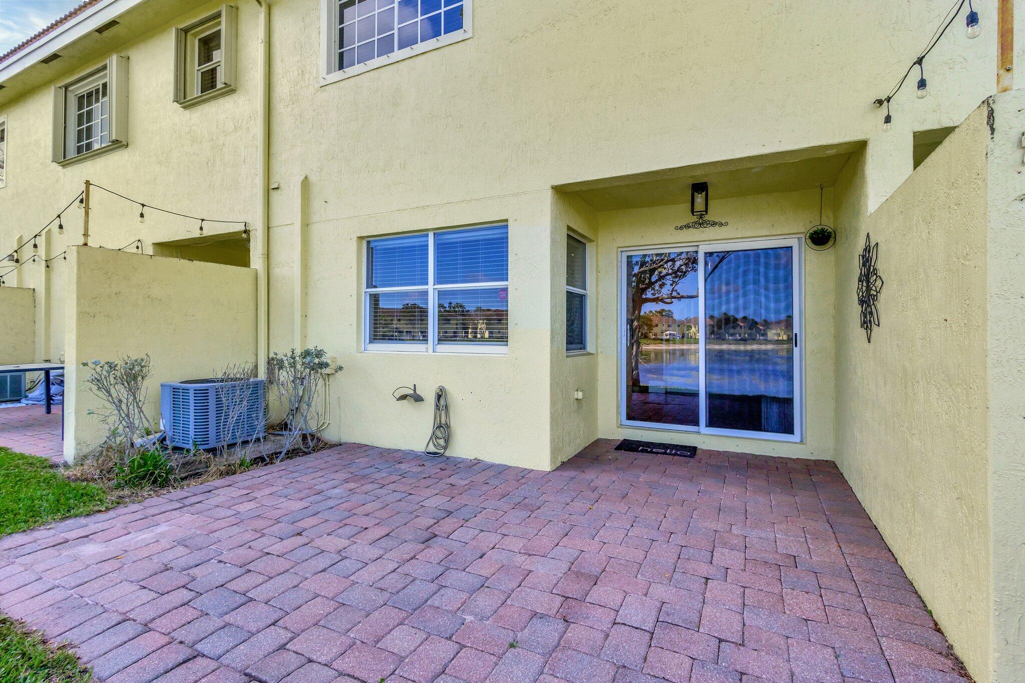 756 Imperial Lake Road West Palm Beach, FL 33413 - Photo 23 of 30 PRIVATE LAKE VIEW PATIO