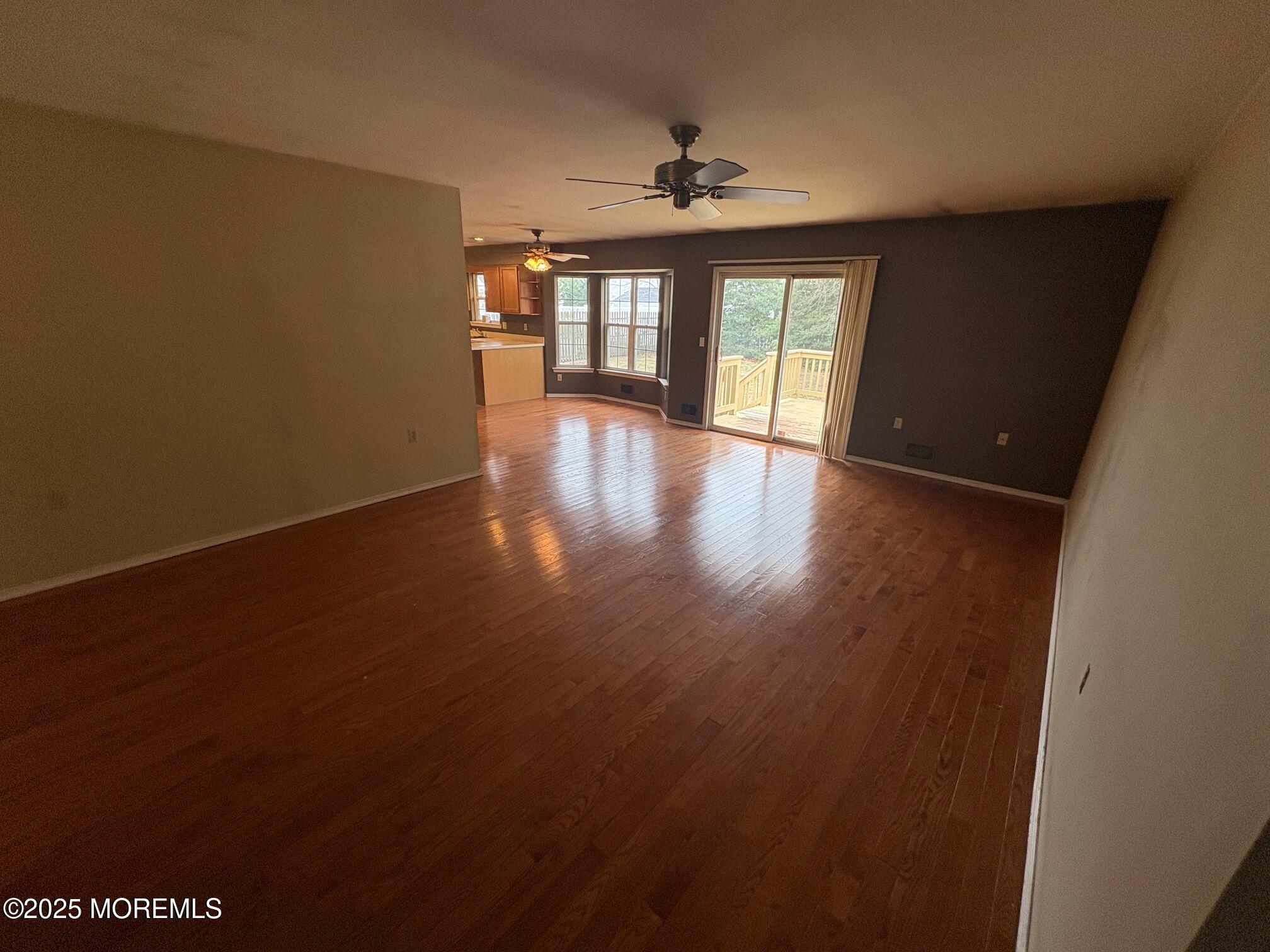 228 Sunset Drive Forked River, NJ 08731 - Photo 4 of 12 a view of an empty room with a window