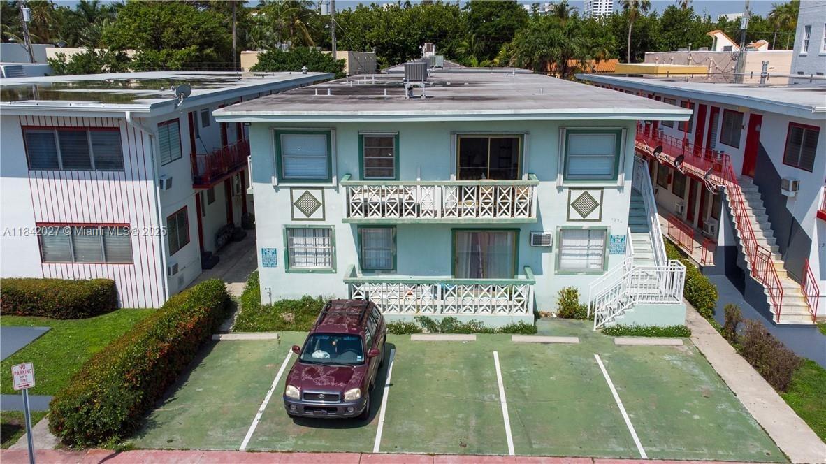 1234 Euclid Avenue, Unit 7 Miami Beach, FL 33139 - Photo 1 of 14 a house view with a garden space