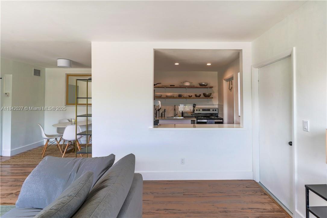 1234 Euclid Avenue, Unit 7 Miami Beach, FL 33139 - Photo 11 of 14 a living room with furniture and a table