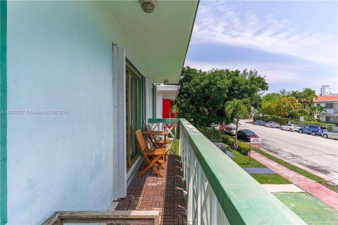 1234 Euclid Avenue, Unit 7 Miami Beach, FL 33139 - Photo 14 of 14 a balcony view with two chairs and a potted plant