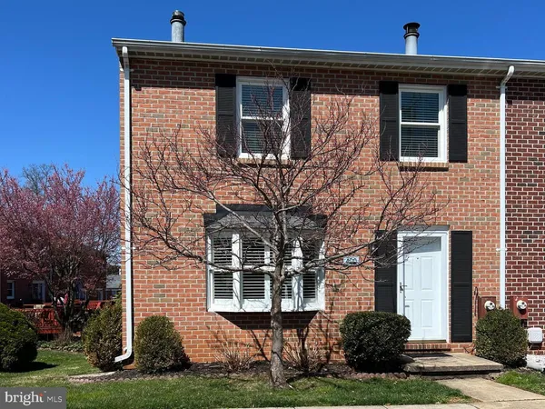 a brick building with a yard