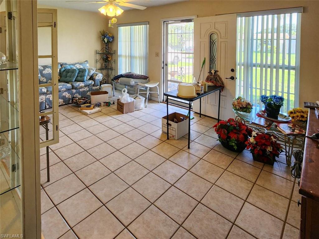 2625 Mohican Drive Melbourne, FL 32935 - Photo 3 of 8 a living room with furniture and a large window