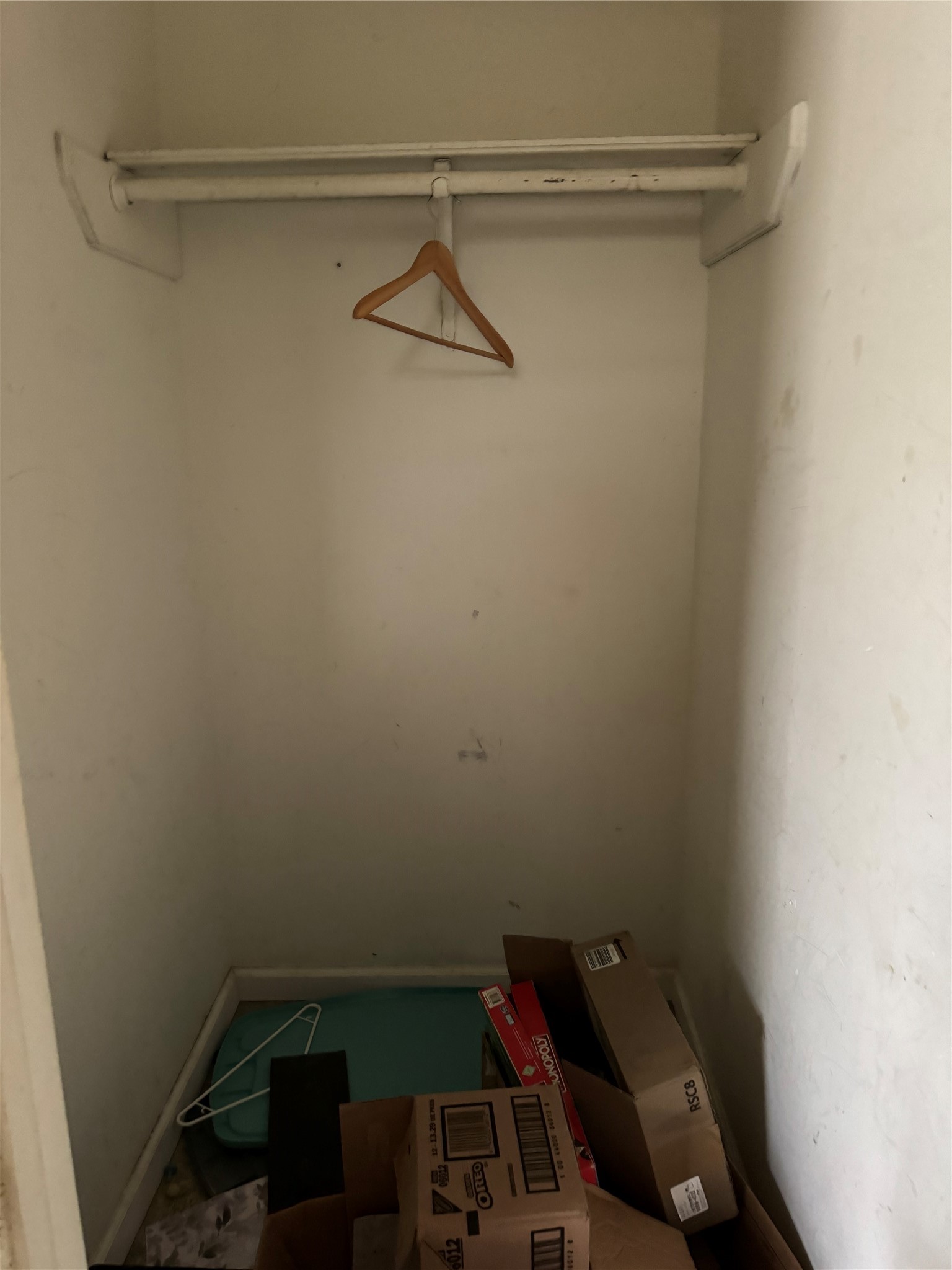 4710 Antha Street Houston, TX 77016 - Photo 7 of 11 a view of storage and utility room with racks on the wall