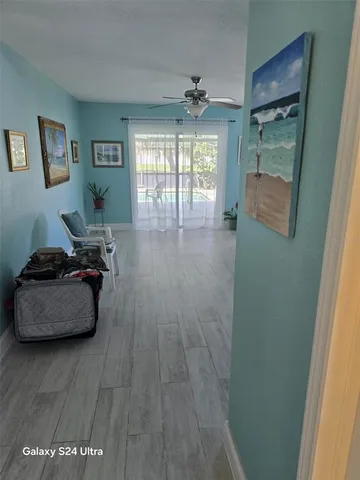 a room that has a lot of windows and painted walls