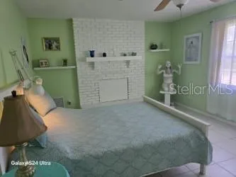 a view of a patio with table and chairs