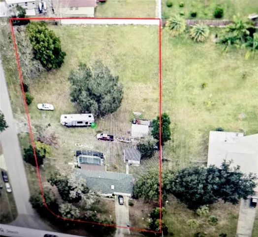 a house view with swimming pool in front of it