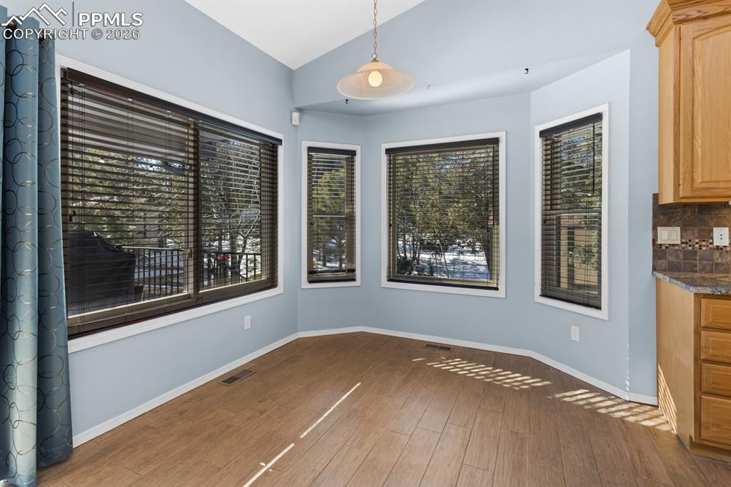 505 Cimarron Road Monument, CO 80132 - Photo 20 of 50 Eat-in nook - with tile flooring flowing throughout
