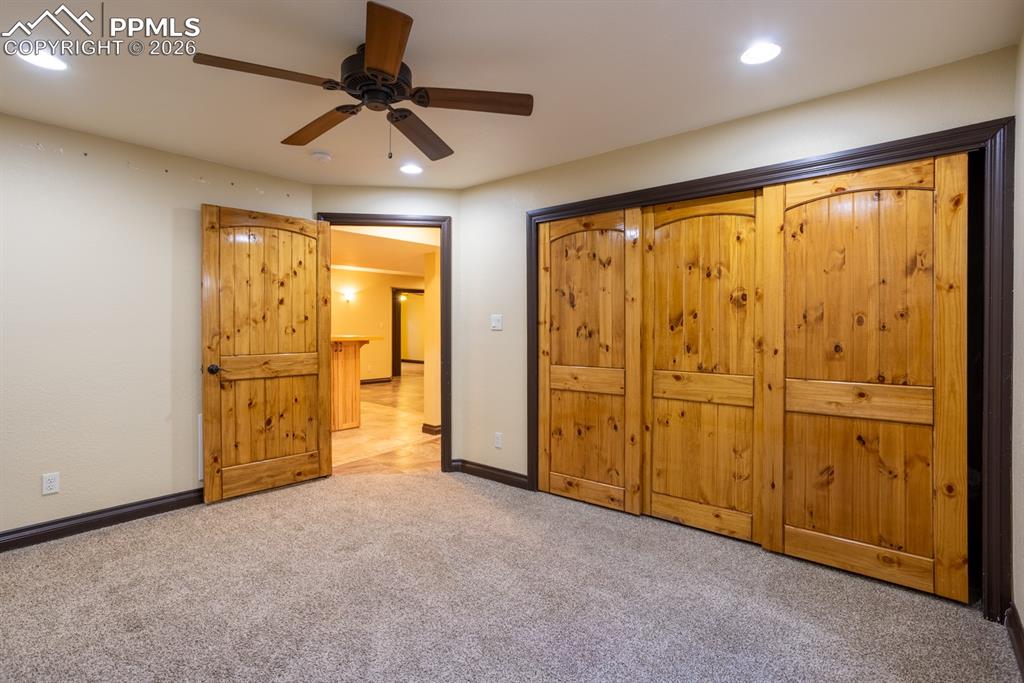 505 Cimarron Road Monument, CO 80132 - Photo 46 of 50 Basement bedroom #4