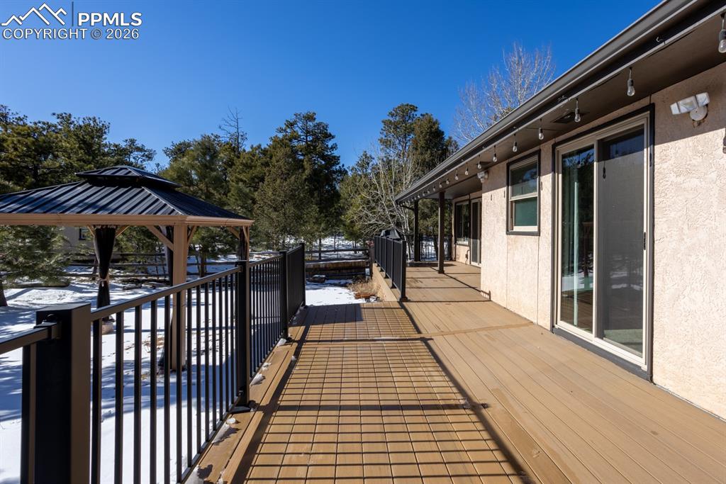 505 Cimarron Road Monument, CO 80132 - Photo 49 of 50 large decking spans the back of the home!