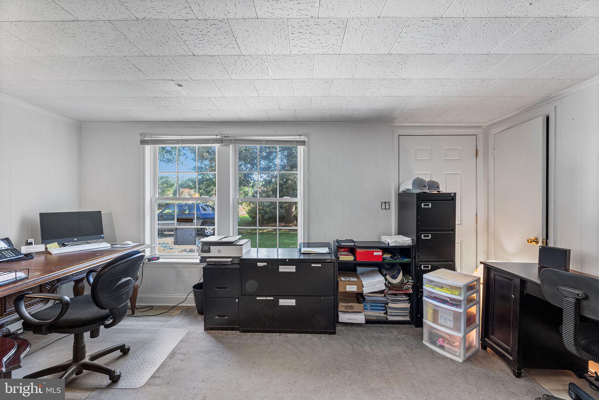 11920 Back Creek Road Bishopville, MD 21813 - Photo 15 of 38 a view of a workspace with furniture and a window