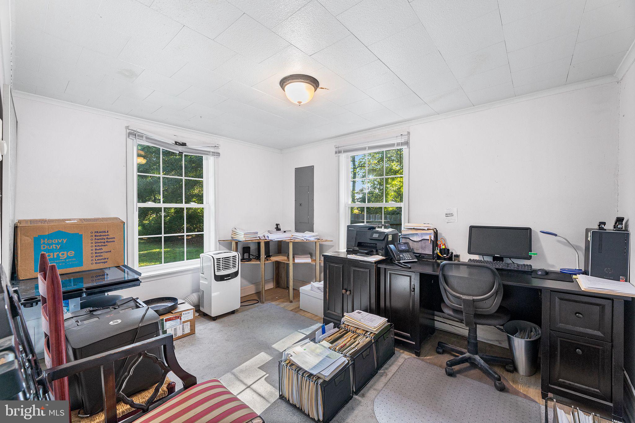 11920 Back Creek Road Bishopville, MD 21813 - Photo 26 of 38 a living room with furniture and a window