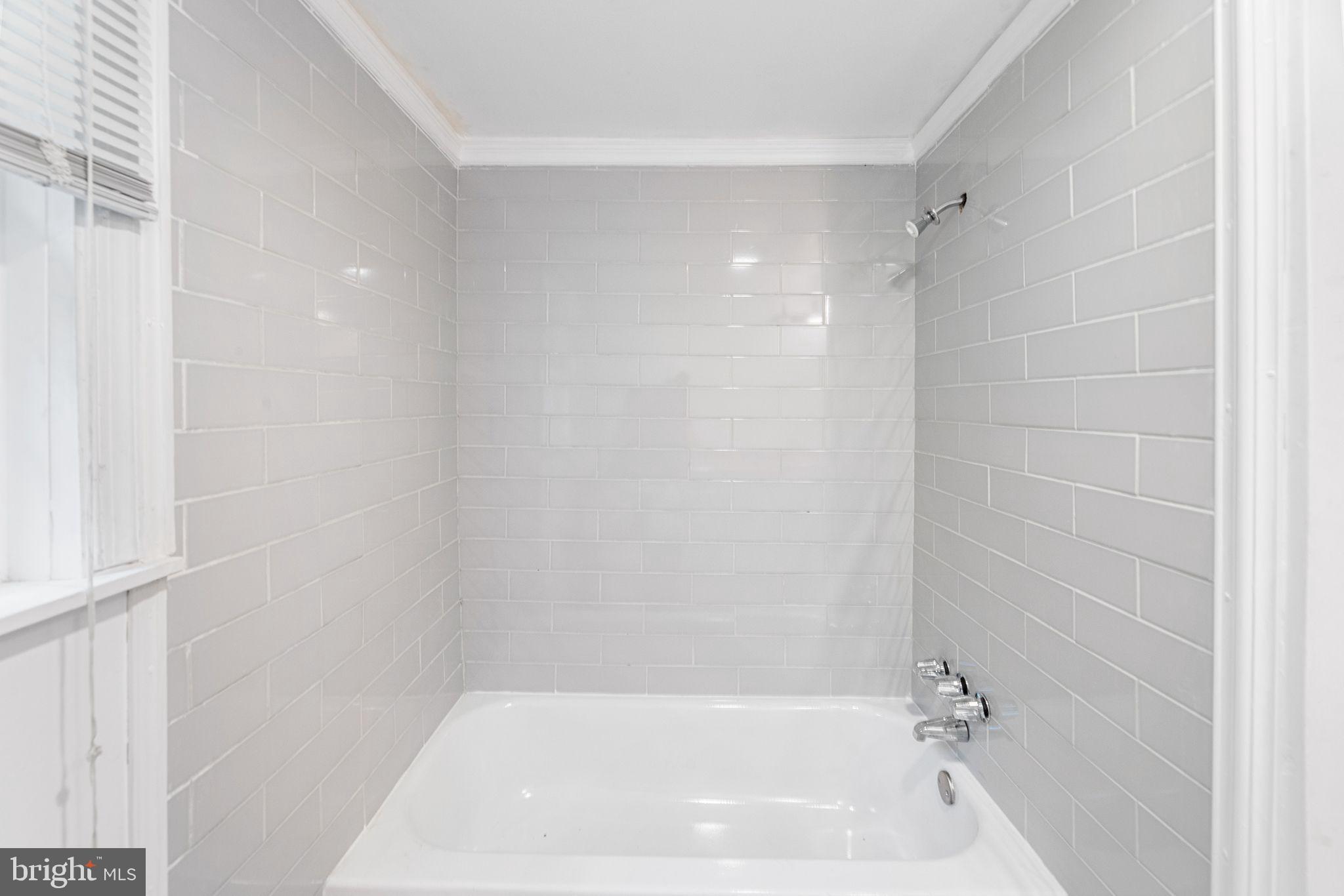 11920 Back Creek Road Bishopville, MD 21813 - Photo 27 of 38 a bathroom with a bathtub