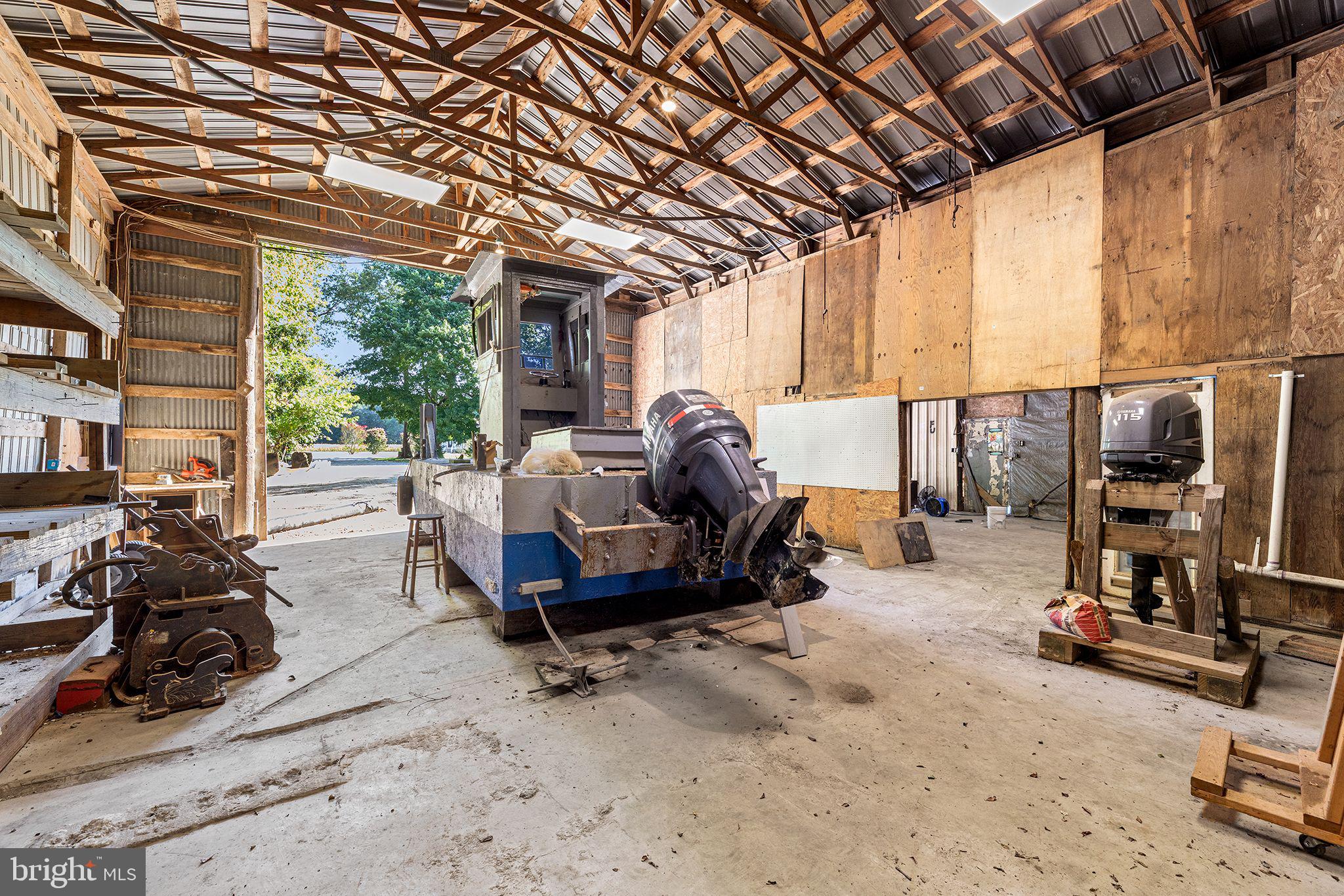 11920 Back Creek Road Bishopville, MD 21813 - Photo 35 of 38 a view of a room with gym equipment