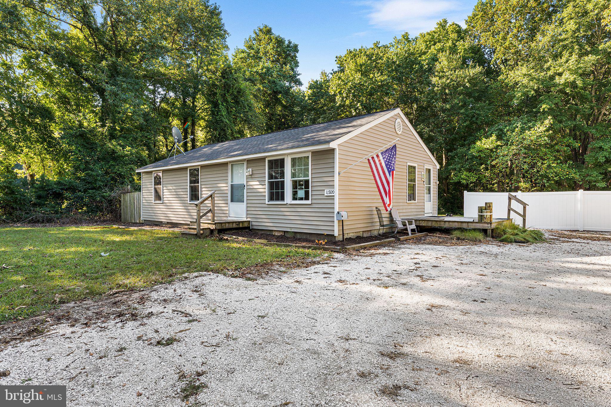 11920 Back Creek Road Bishopville, MD 21813 - Photo 7 of 38 a view of a house with a yard