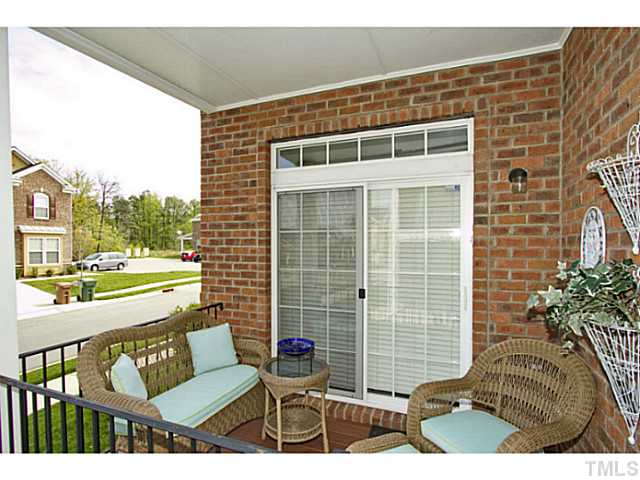 1802 Affirmed Way Cary, NC 27519 - Photo 18 of 24 a view of balcony with couch