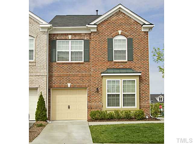 1802 Affirmed Way Cary, NC 27519 - Photo 20 of 24 a front view of a house with garden