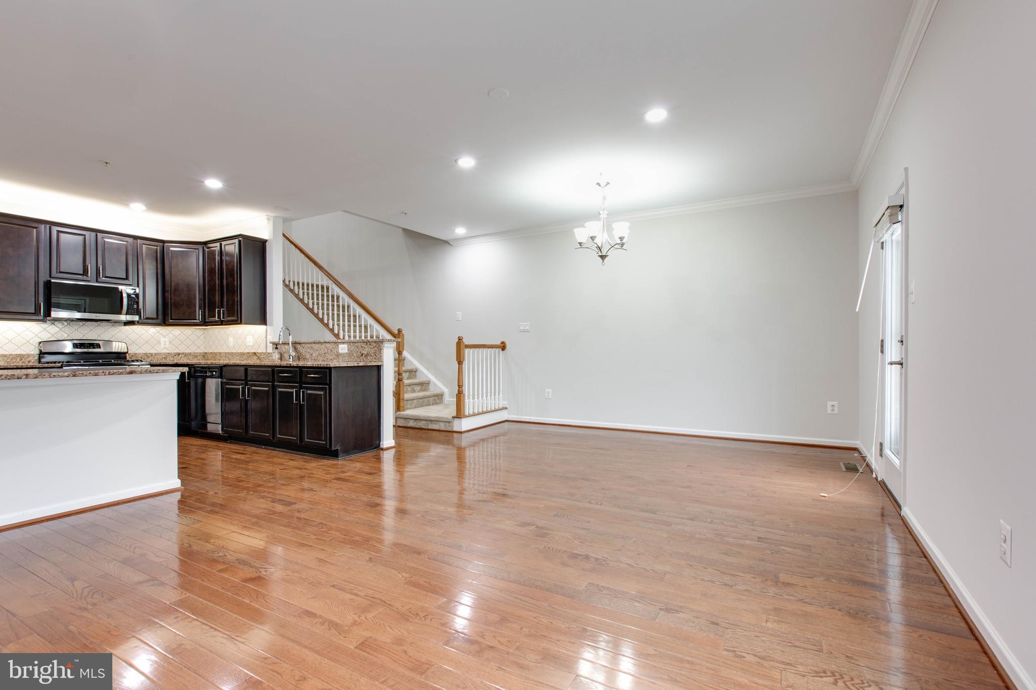 2706 Amber Crest Road Hanover, MD 21076 - Photo 11 of 44 a view of kitchen with microwave and cabinets