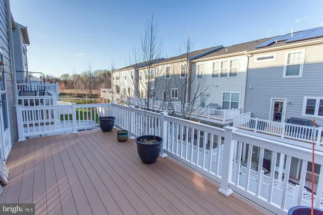 a view of a balcony with furniture