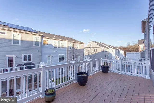 a view of roof deck with patio