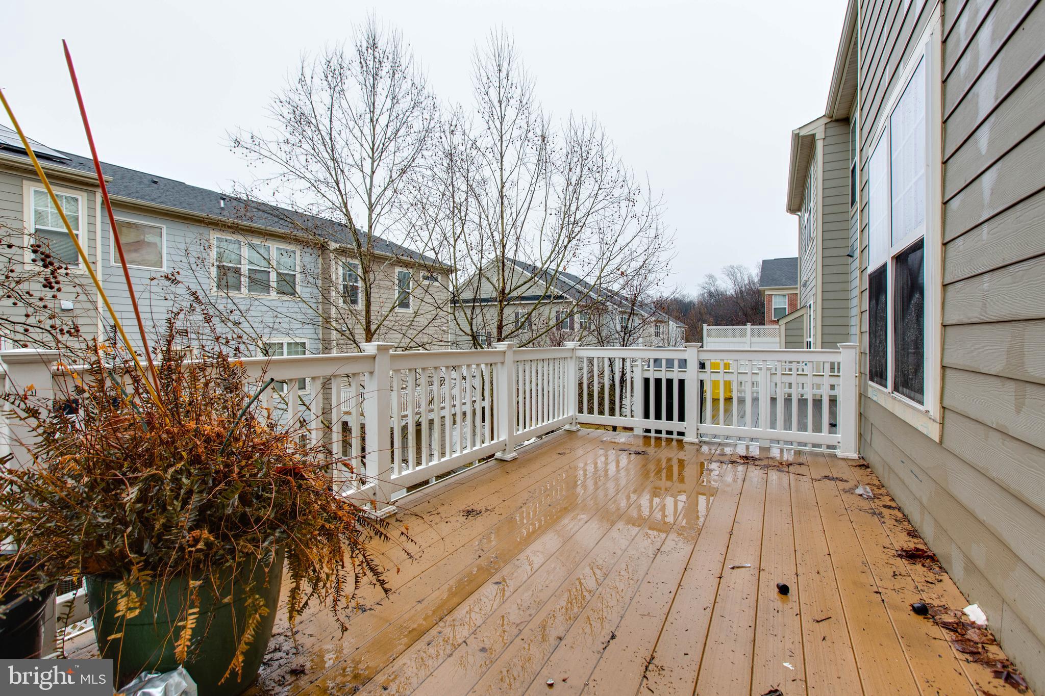 2706 Amber Crest Road Hanover, MD 21076 - Photo 17 of 44 a view of a house with a deck