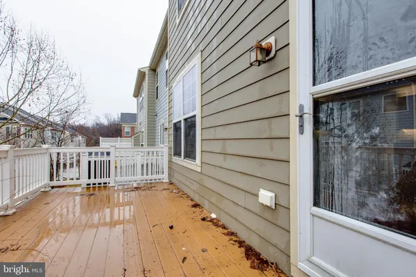 a view of balcony with wooden floor