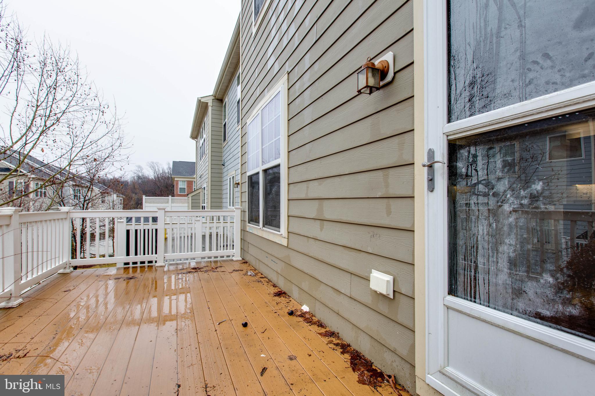 2706 Amber Crest Road Hanover, MD 21076 - Photo 18 of 44 a view of balcony with wooden floor