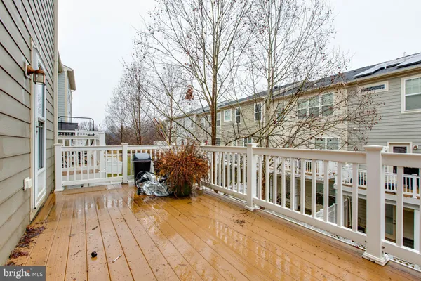 a balcony with wooden floor