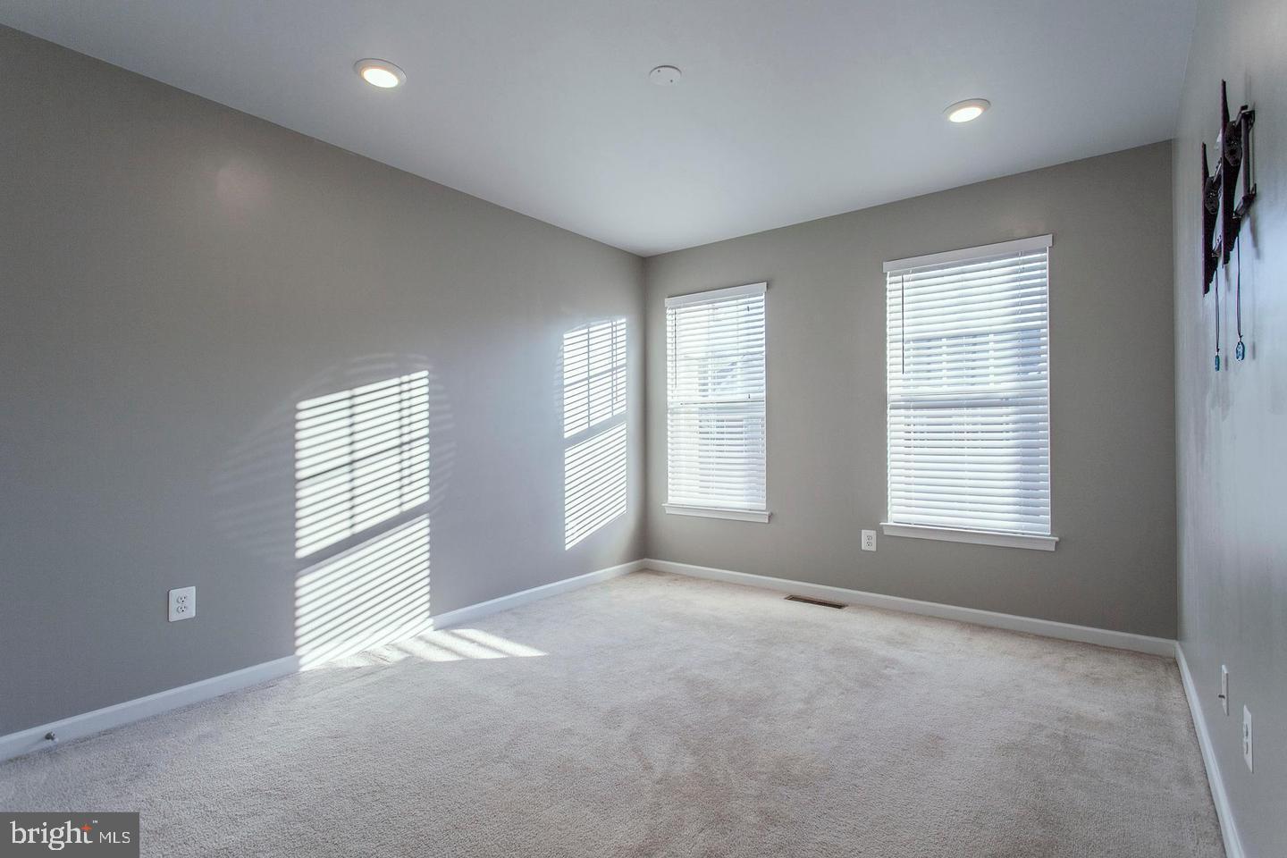 2706 Amber Crest Road Hanover, MD 21076 - Photo 21 of 28 a view of an empty room with a window