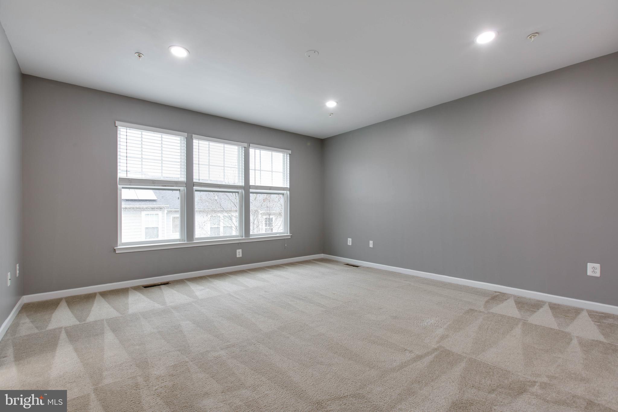 2706 Amber Crest Road Hanover, MD 21076 - Photo 22 of 44 a view of an empty room with a window