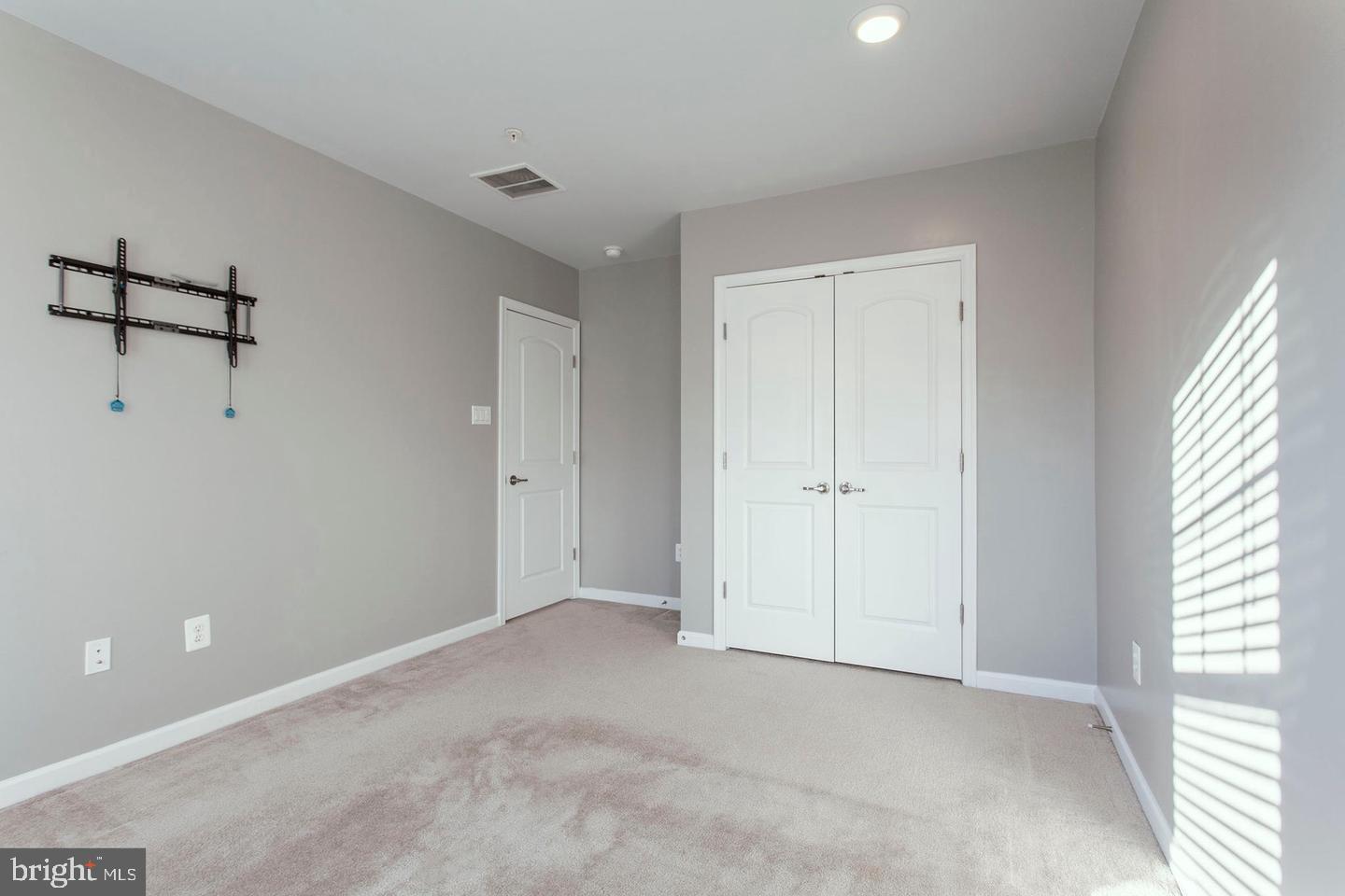 2706 Amber Crest Road Hanover, MD 21076 - Photo 22 of 28 a view of an empty room with a window