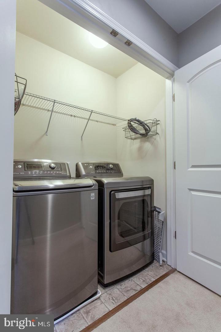 2706 Amber Crest Road Hanover, MD 21076 - Photo 25 of 28 a utility room with washer and dryer