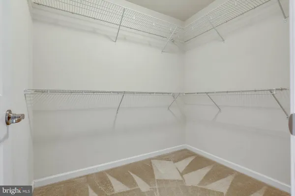 a view of a room with racks on the wall