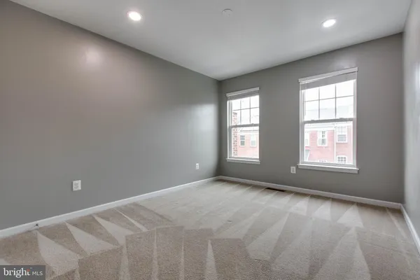 an empty room with windows