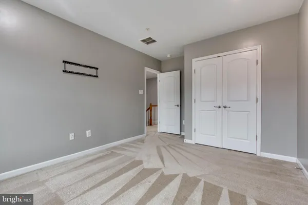 a view of a livingroom with an empty space