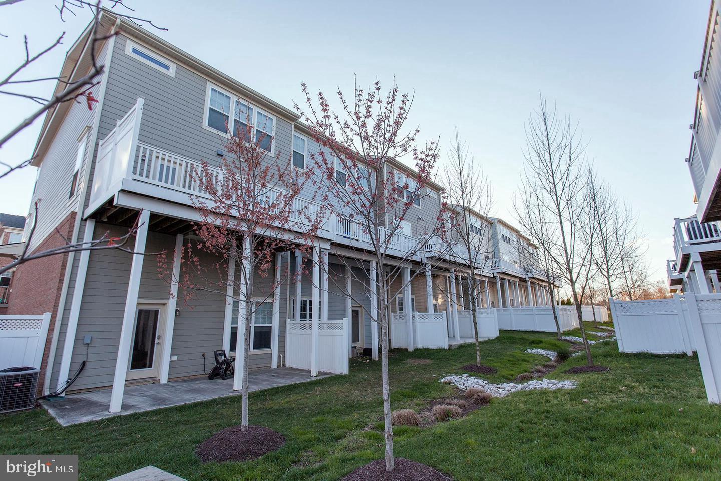 2706 Amber Crest Road Hanover, MD 21076 - Photo 28 of 28 a view of a house with a yard and plants