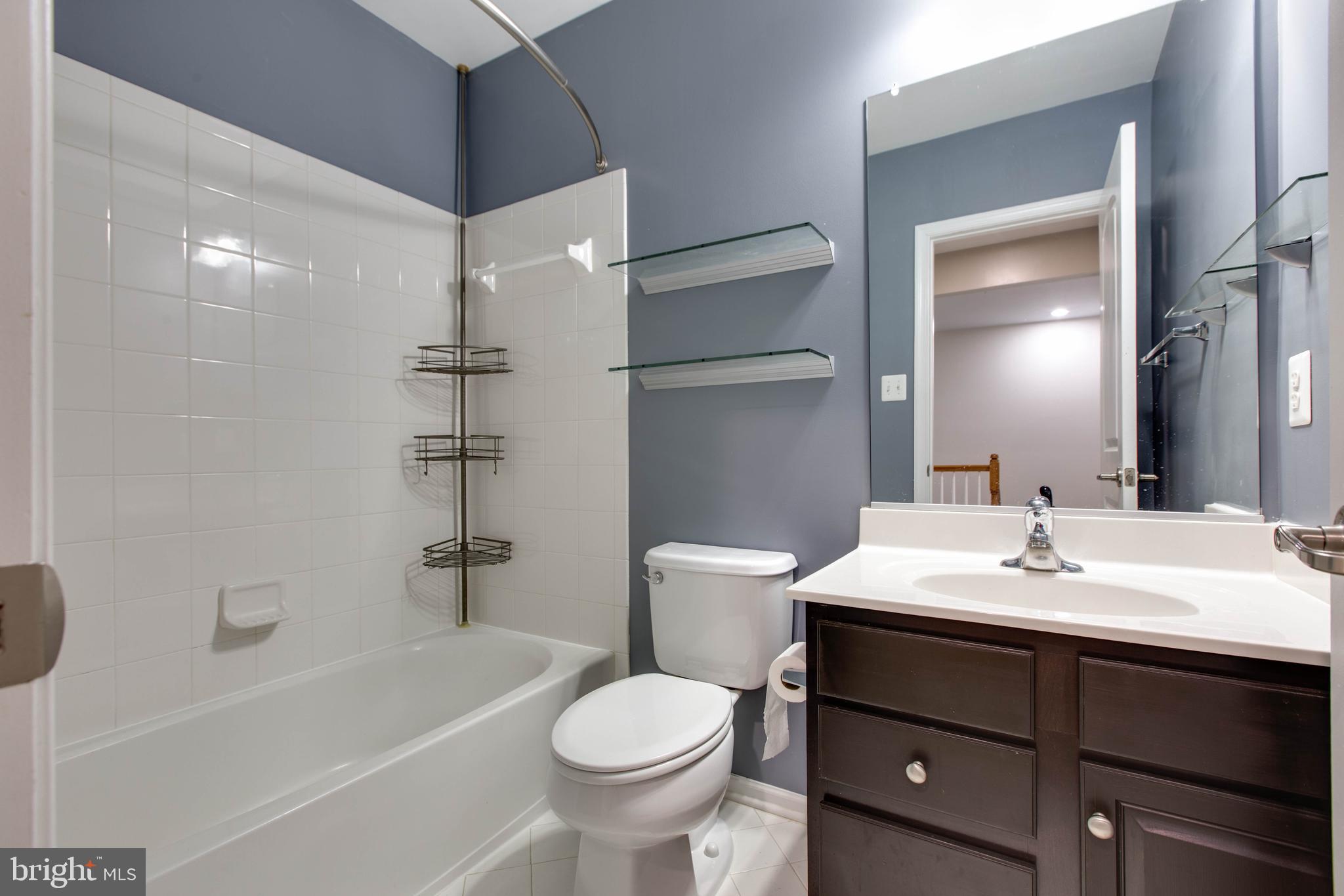 2706 Amber Crest Road Hanover, MD 21076 - Photo 30 of 44 a bathroom with a sink toilet and shower