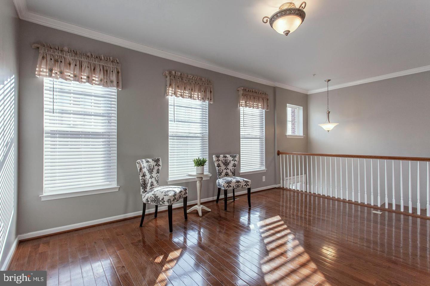 2706 Amber Crest Road Hanover, MD 21076 - Photo 3 of 28 a living room with furniture and wooden floor