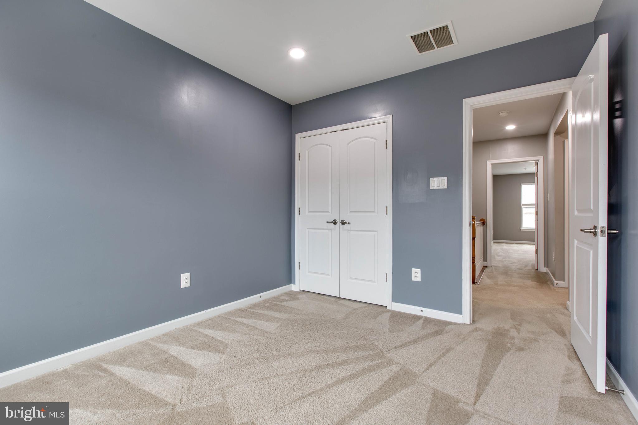 2706 Amber Crest Road Hanover, MD 21076 - Photo 33 of 44 wooden floor in a hall with an entryway