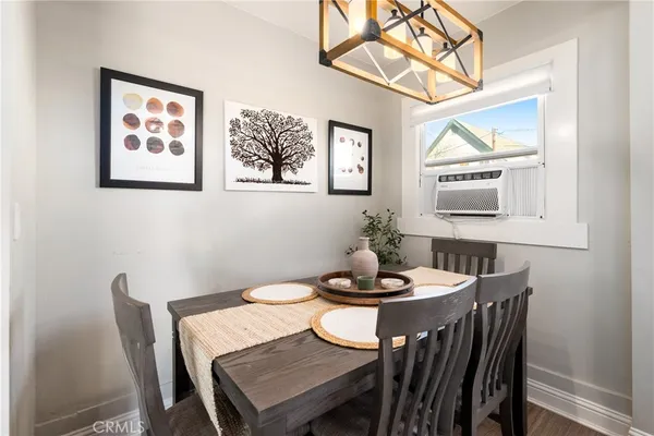 a kitchen with stainless steel appliances a refrigerator stove microwave and cabinets